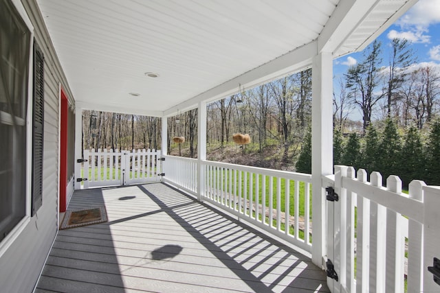 34 Kent Rd, Warren, CT 06754 - deck featuring covered porch