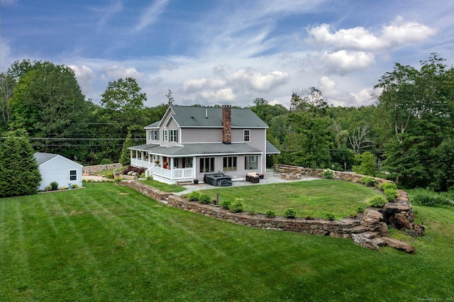 34 Kent Rd, Warren, CT 06754 - rear view of property with a fire pit, a shingled roof, a chimney, a lawn, and covered porch