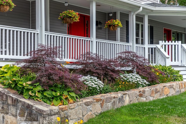 34 Kent Rd, Warren, CT 06754 - doorway to property featuring a porch