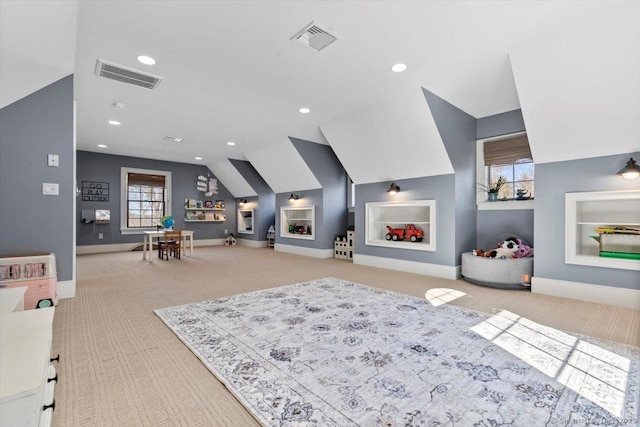 game room with visible vents, baseboards, carpet floors, and built in shelves