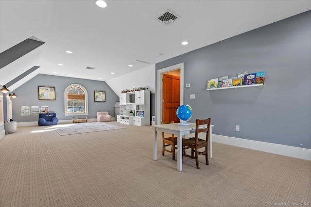 game room with light colored carpet, visible vents, recessed lighting, baseboards, and lofted ceiling with skylight