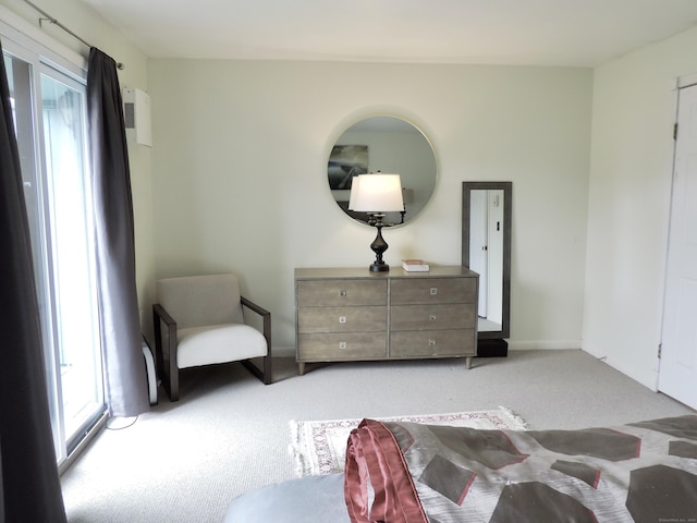 bedroom with baseboards, multiple windows, and carpet flooring