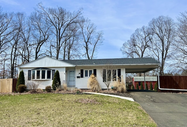 18 Nancy Dr, Enfield, CT 06082 - ranch-style home with aphalt driveway, fence, an attached carport, and a front yard