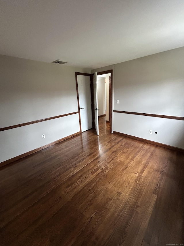 18 Nancy Dr, Enfield, CT 06082 - unfurnished room with wood finished floors, baseboards, and visible vents