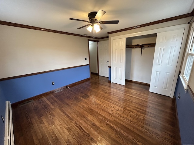 18 Nancy Dr, Enfield, CT 06082 - unfurnished bedroom featuring crown molding, a closet, visible vents, baseboards, and dark wood-style floors