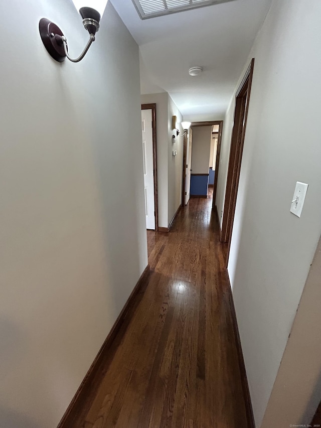 18 Nancy Dr, Enfield, CT 06082 - corridor with baseboards and dark wood-style floors
