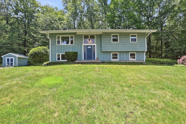 36 Musket Ridge Rd, New Fairfield, CT 06812 - split foyer home with a front lawn and a storage unit
