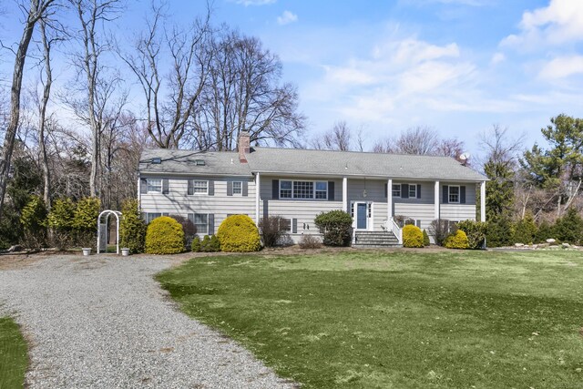 285 Greens Farms Rd, Westport, CT 06880 - raised ranch with a chimney, a front lawn, and driveway