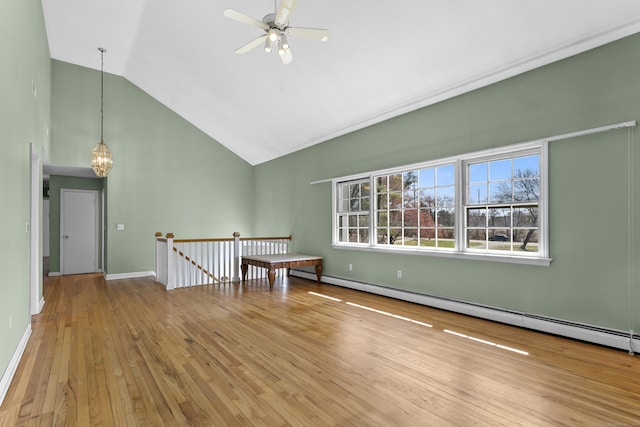 285 Greens Farms Rd, Westport, CT 06880 - spare room featuring hardwood / wood-style floors, baseboard heating, high vaulted ceiling, a ceiling fan, and a chandelier