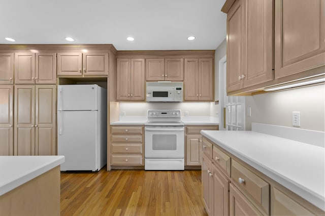 285 Greens Farms Rd, Westport, CT 06880 - kitchen with white appliances, light countertops, light wood-style flooring, recessed lighting, and light brown cabinets