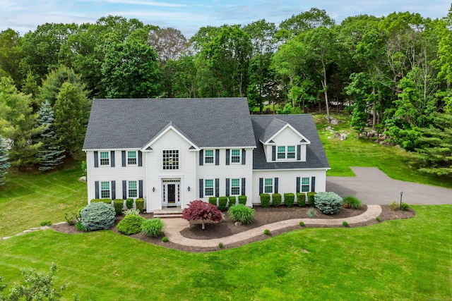 4 Shoreview Ln, Danbury, CT 06811 - colonial home with a front yard and roof with shingles