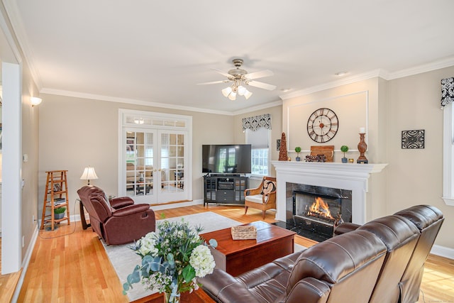 4 Shoreview Ln, Danbury, CT 06811 - living area featuring crown molding, a high end fireplace, baseboards, wood finished floors, and a ceiling fan