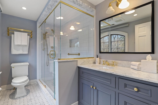 bathroom with vanity, baseboards, tile patterned flooring, toilet, and a shower stall