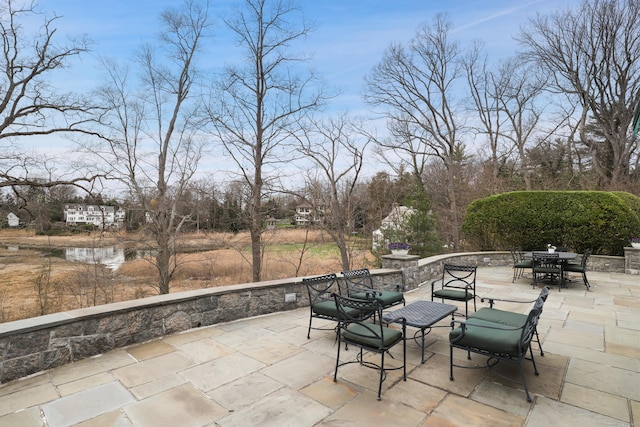 view of patio featuring outdoor dining area