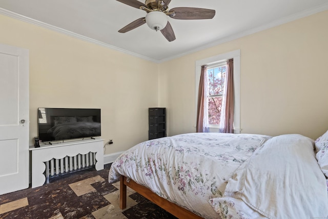 bedroom with crown molding, a ceiling fan, and baseboards