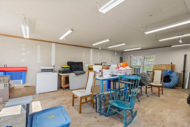 misc room with concrete floors and washer / clothes dryer