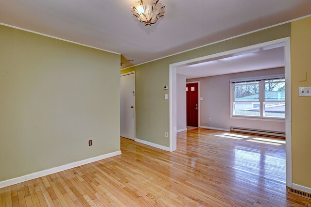 137 Harding Ave, West Haven, CT 06516 - unfurnished room with a baseboard radiator, light wood-type flooring, ornamental molding, and baseboards