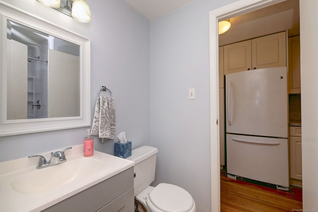 137 Harding Ave, West Haven, CT 06516 - bathroom with wood finished floors, toilet, vanity, and a shower