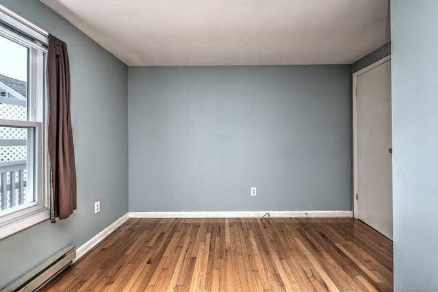 137 Harding Ave, West Haven, CT 06516 - unfurnished room with baseboard heating, healthy amount of natural light, and baseboards
