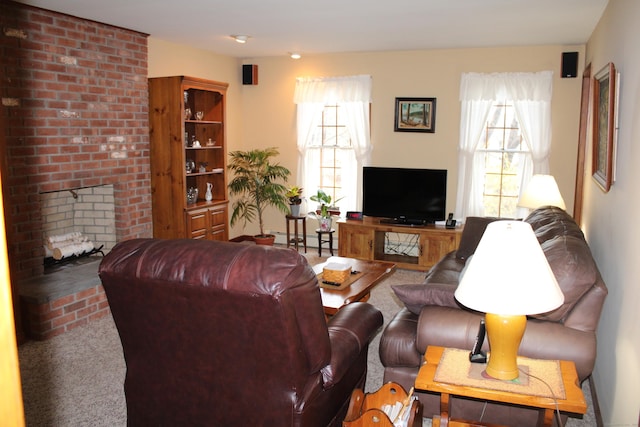 244 Walnut Tree Hill Rd, Shelton, CT 06484 - carpeted living room with a baseboard heating unit and a fireplace