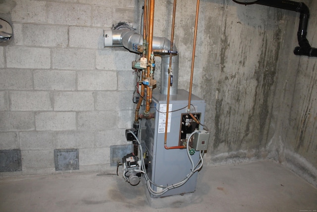 244 Walnut Tree Hill Rd, Shelton, CT 06484 - utility room featuring a heating unit