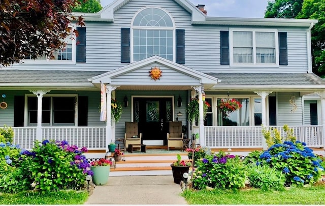 269 Silver Hill Rd, Derby, CT 06418 - view of front of property featuring a shingled roof and covered porch