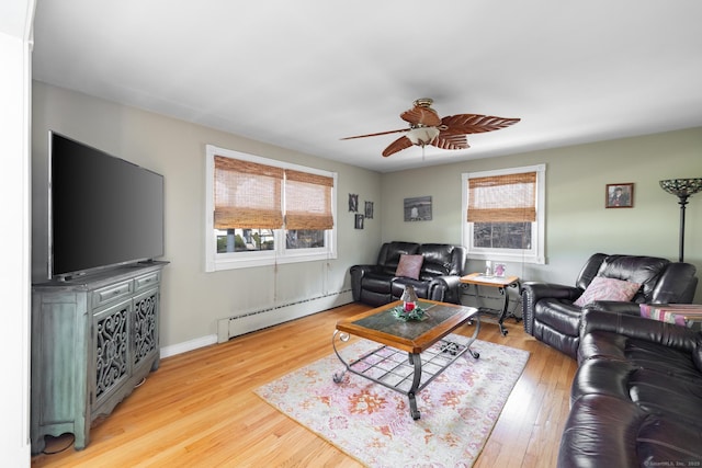 269 Silver Hill Rd, Derby, CT 06418 - living room featuring a baseboard radiator, a wealth of natural light, and wood finished floors