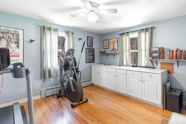 269 Silver Hill Rd, Derby, CT 06418 - workout room featuring baseboard heating, light wood-type flooring, baseboards, and a ceiling fan