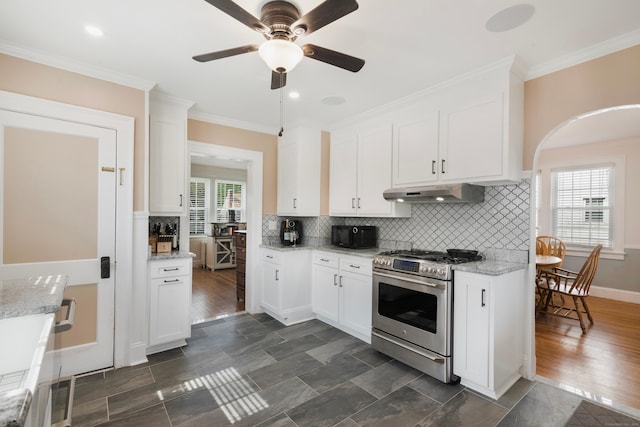37 Dale Rd, Wethersfield, CT 06109 - kitchen featuring stainless steel gas range oven, extractor fan, ceiling fan, white cabinetry, and crown molding