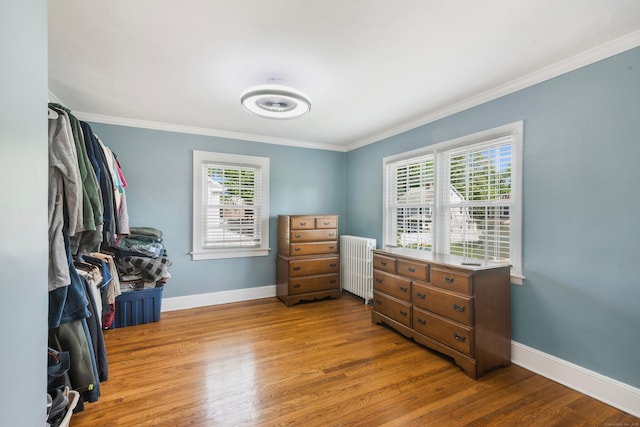 37 Dale Rd, Wethersfield, CT 06109 - bedroom featuring radiator, ornamental molding, and wood finished floors