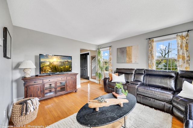 38 Benjamin Rd, East Haven, CT 06513 - living room featuring baseboards and light wood finished floors