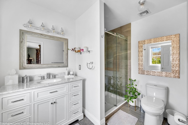 38 Benjamin Rd, East Haven, CT 06513 - full bathroom featuring visible vents, a stall shower, vanity, baseboards, and toilet