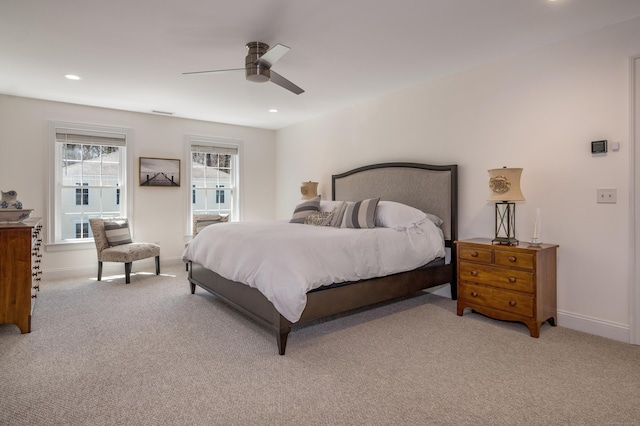 bedroom with recessed lighting, a ceiling fan, baseboards, and light carpet