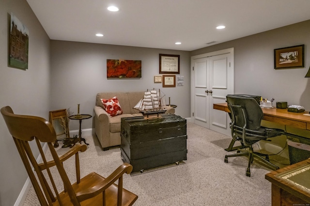 office space with baseboards, recessed lighting, and light colored carpet