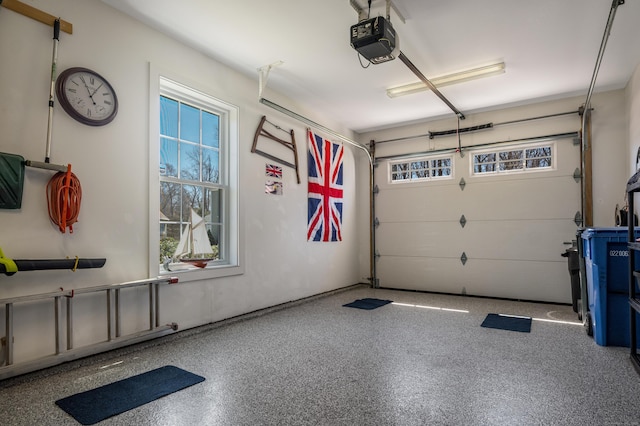 garage featuring a garage door opener