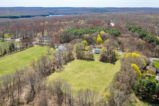 aerial view featuring a view of trees