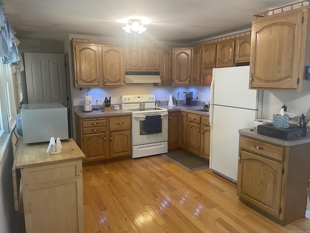7 Glen Cir, Seymour, CT 06483 - kitchen featuring white appliances, exhaust hood, light wood-style floors, a sink, and brown cabinets