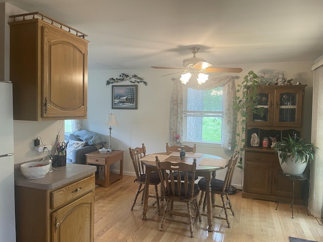 7 Glen Cir, Seymour, CT 06483 - dining room with a ceiling fan, light wood-style flooring, and plenty of natural light
