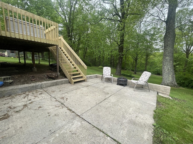 7 Glen Cir, Seymour, CT 06483 - view of patio / terrace featuring an outdoor fire pit, stairway, and a deck
