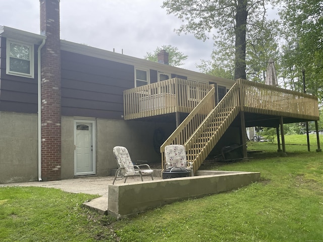 7 Glen Cir, Seymour, CT 06483 - rear view of house featuring a lawn, a wooden deck, and stairway