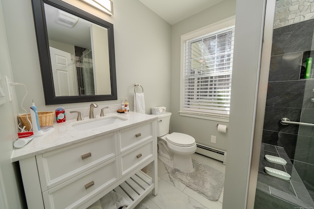 full bathroom with baseboard heating, vanity, marble finish floor, toilet, and tiled shower