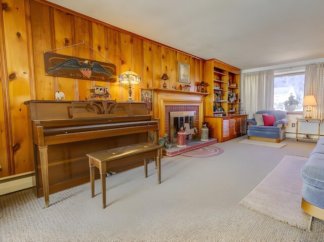67 Stuart St, Newington, CT 06111 - carpeted living room with wood walls and a fireplace