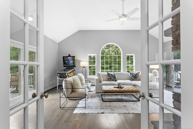 10 Applegate Ln, Monroe, CT 06468 - living area featuring french doors, wood finished floors, ceiling fan, and lofted ceiling