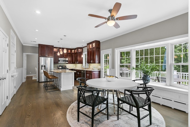 10 Applegate Ln, Monroe, CT 06468 - dining space featuring crown molding, dark wood finished floors, a baseboard heating unit, a ceiling fan, and recessed lighting