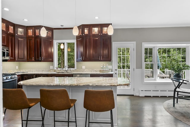 10 Applegate Ln, Monroe, CT 06468 - kitchen featuring stainless steel appliances, plenty of natural light, tasteful backsplash, recessed lighting, and a wainscoted wall