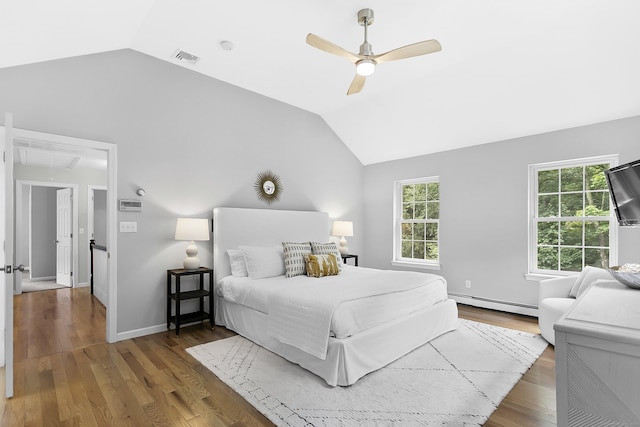 10 Applegate Ln, Monroe, CT 06468 - bedroom with attic access, lofted ceiling, a baseboard heating unit, wood finished floors, and a ceiling fan