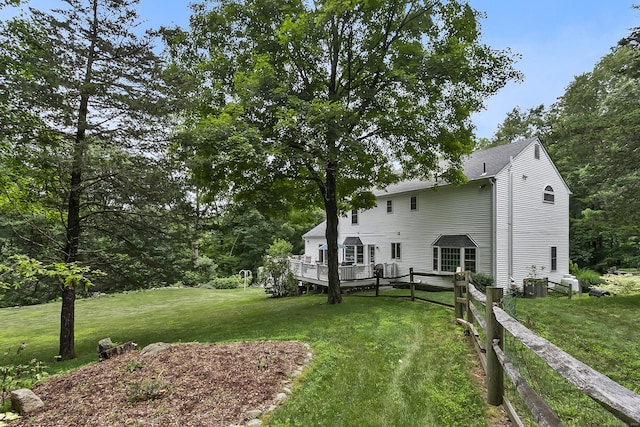 10 Applegate Ln, Monroe, CT 06468 - rear view of house with a wooden deck and a shingled roof