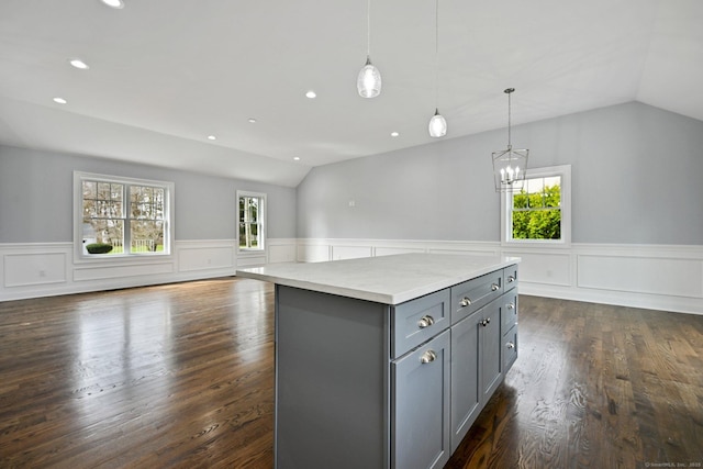 01 Sunrise Rd, Danbury, CT 06811 - kitchen with gray cabinetry, vaulted ceiling, wainscoting, dark wood finished floors, and a center island