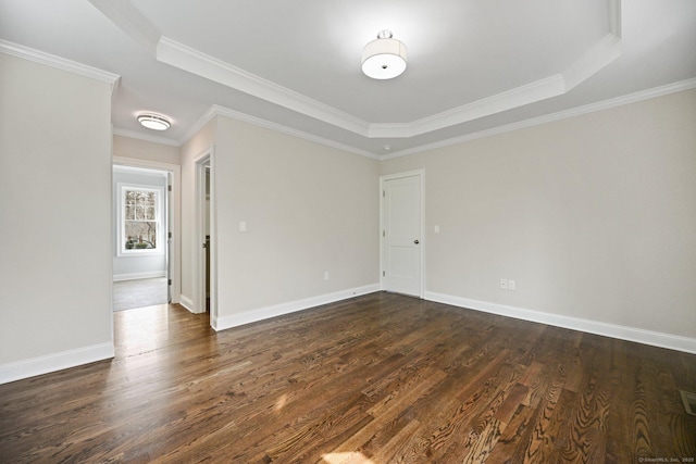 01 Sunrise Rd, Danbury, CT 06811 - spare room with a raised ceiling, dark wood-style flooring, and crown molding