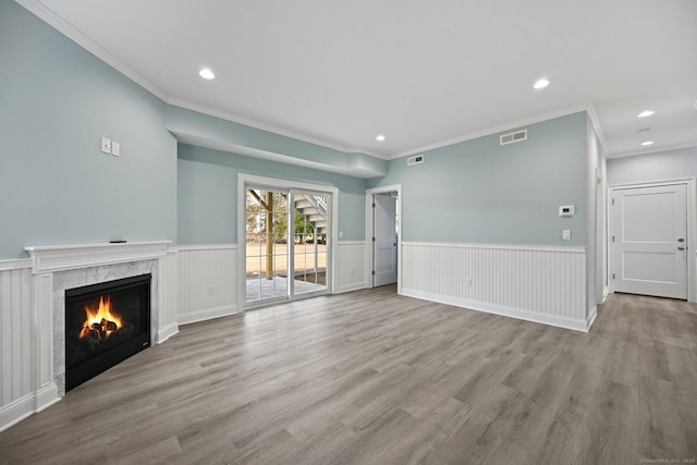 01 Sunrise Rd, Danbury, CT 06811 - unfurnished living room with a fireplace, wood finished floors, ornamental molding, recessed lighting, and a wainscoted wall